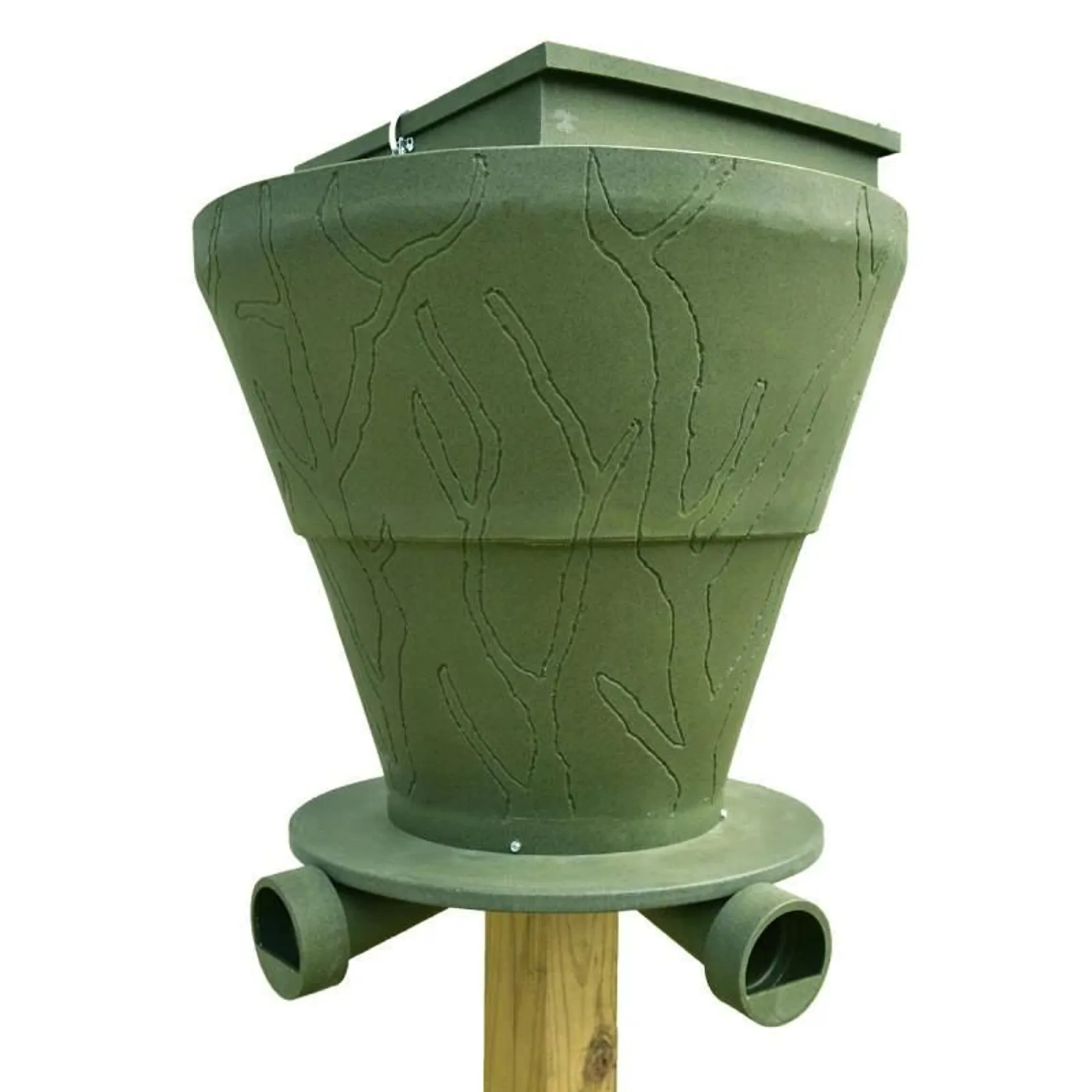 Close-up of green textured deer feeder base with tree bark pattern mounted on wooden post with feed dispenser tubes