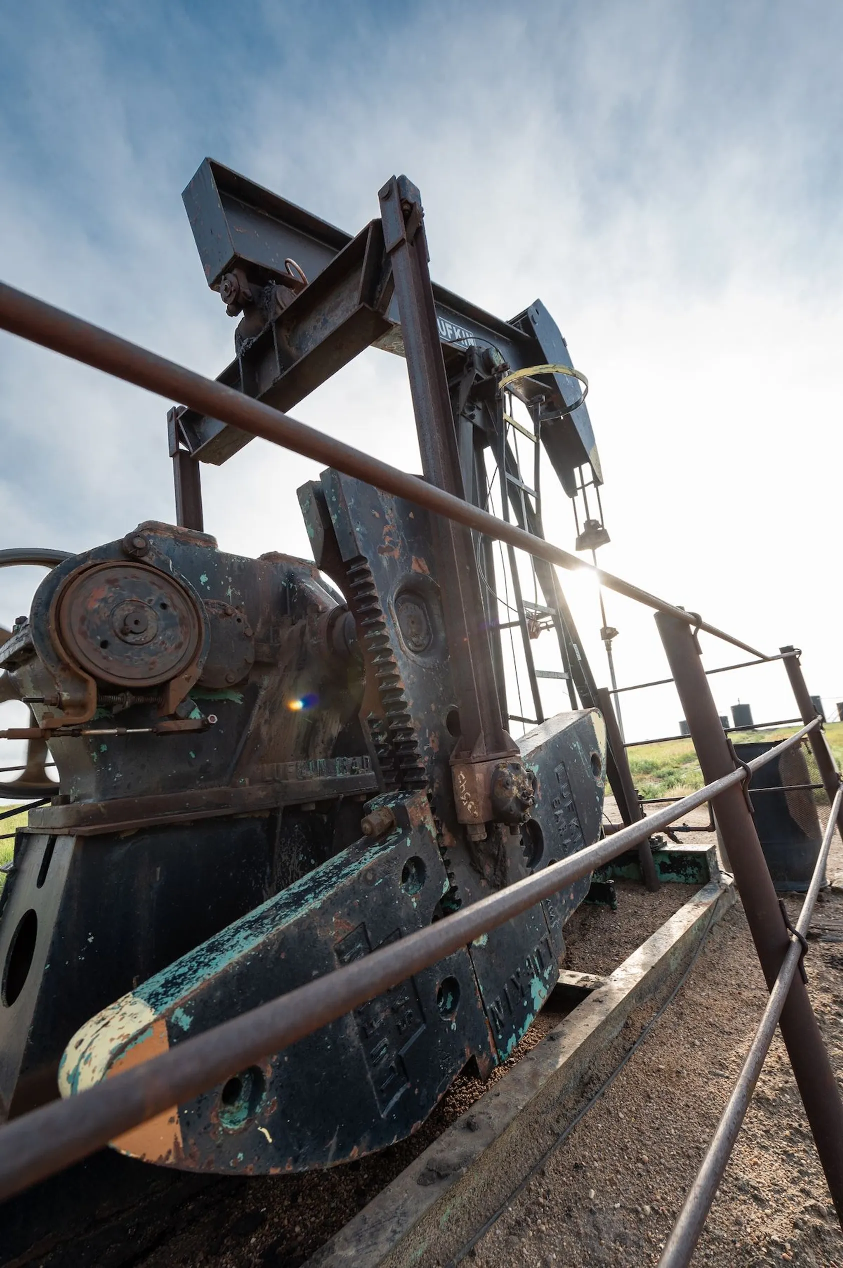 Close-up view of heavy drilling or extraction equipment machinery, showing the industrial tools used in mineral extraction