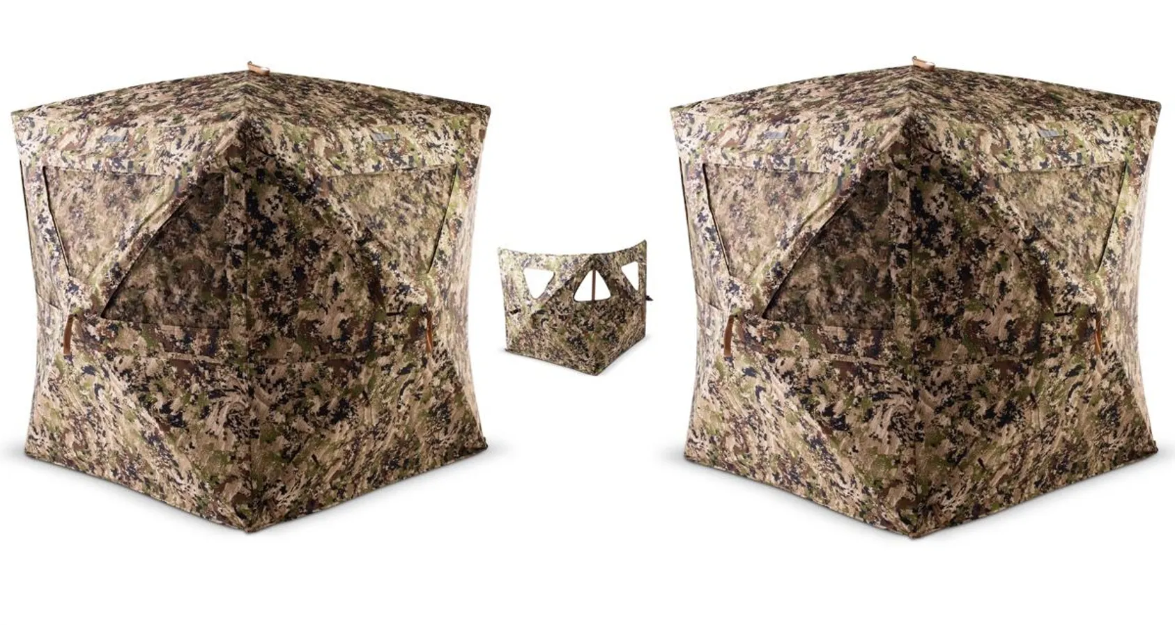 Rig 'Em Right HydeOut hunting blind set up in a field with hunters inside, demonstrating the concealment and comfort benefits for turkey hunting